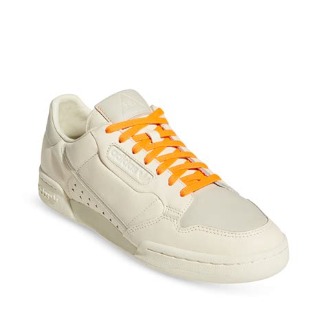 adidas mens Pharrell Williams Continental 80, Ecru Tint/Cream .